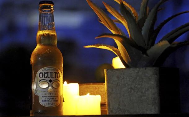 AB beer brand Oculto showcases new illuminated bottle design