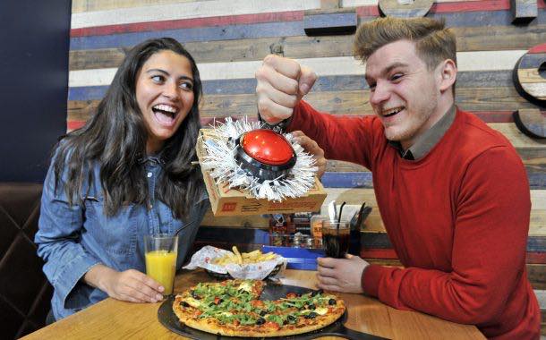 Pizza Hut's festive activations include button to start Christmas