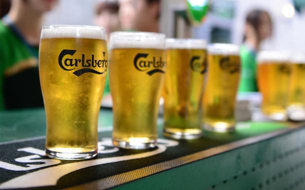 Carlsberg revenues boosted by warm weather and World Cup
