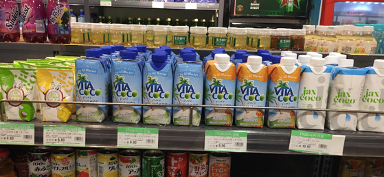 Imported coconut water product offerings on shelf