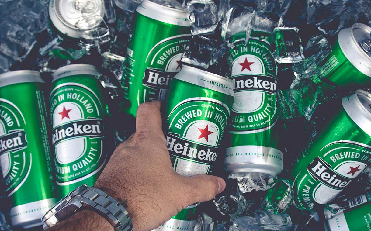 Heineken profits fall 52% in HY results, sees 